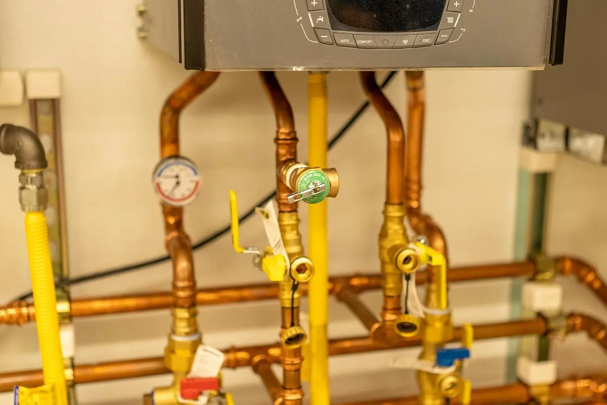 Licensed technician providing Water Heater Installation for a homeowner in Brookline